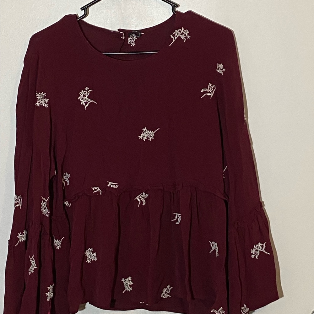 Maroon top with white thread work | size - L | well maintained